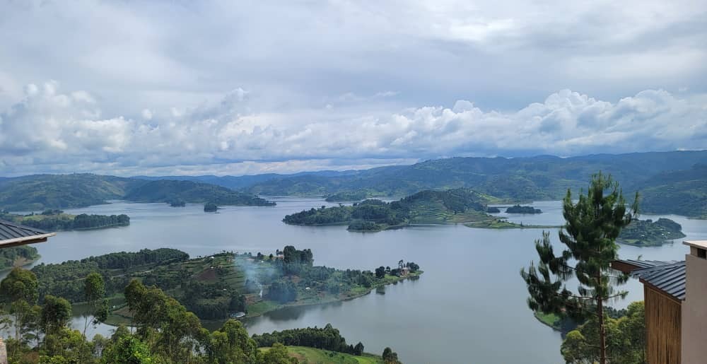 Panoramic view of Lake Bunyonyi with its small green islands surrounded by rolling hills in southwestern Uganda.