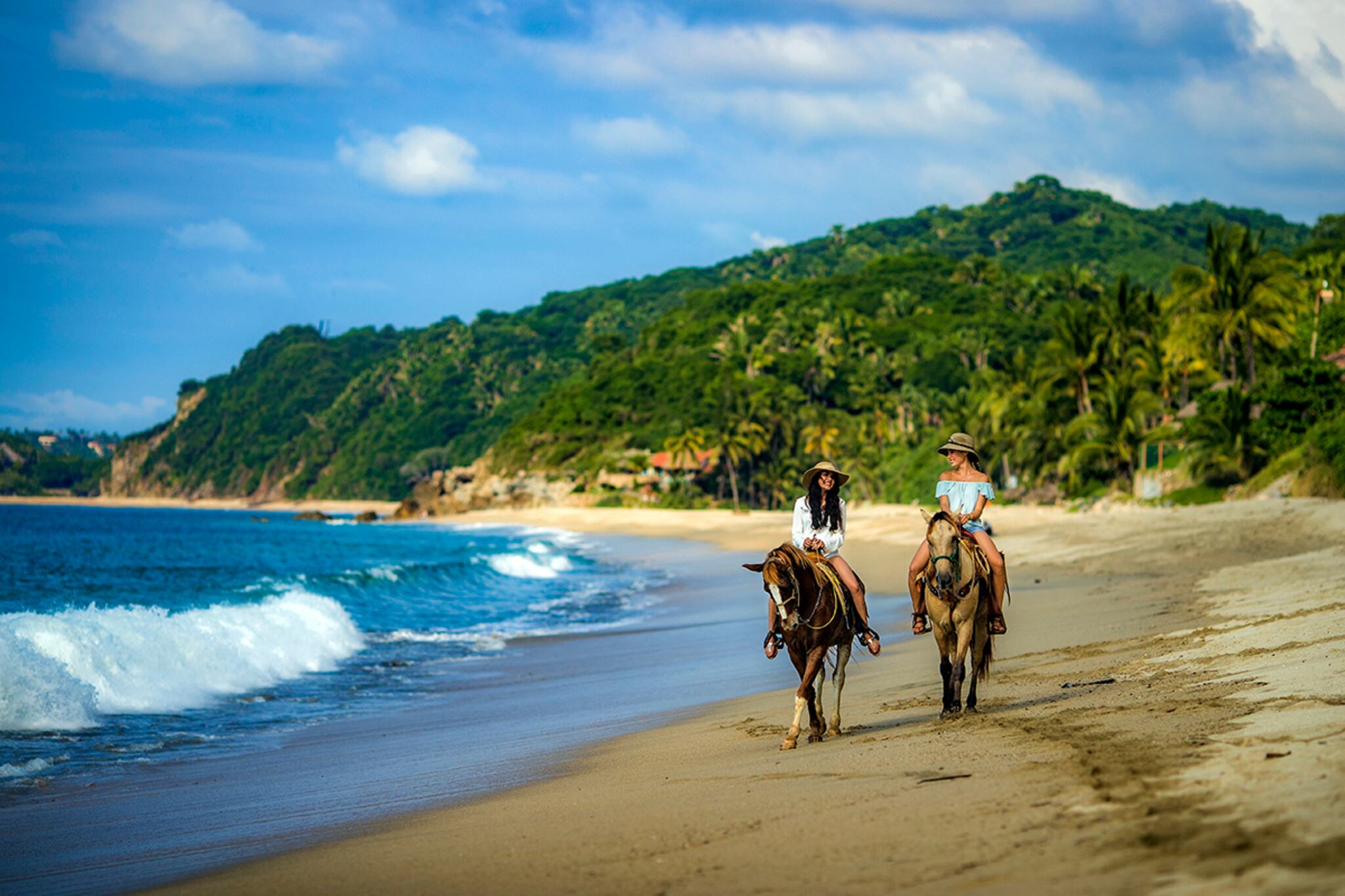 Riviera Nayarit Beyond the Resorts: What Most Visitors Miss 3 Horse back riders on The Pacific coast of Nayarit